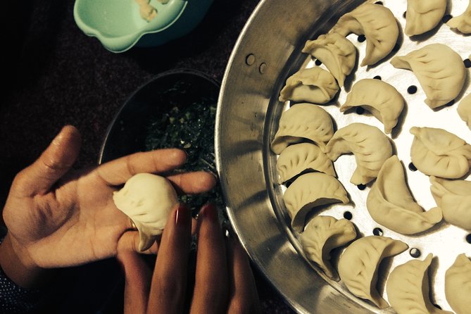 Cook and Dine with a Local family - Inside the class: learning Nepali technique through dal bhat