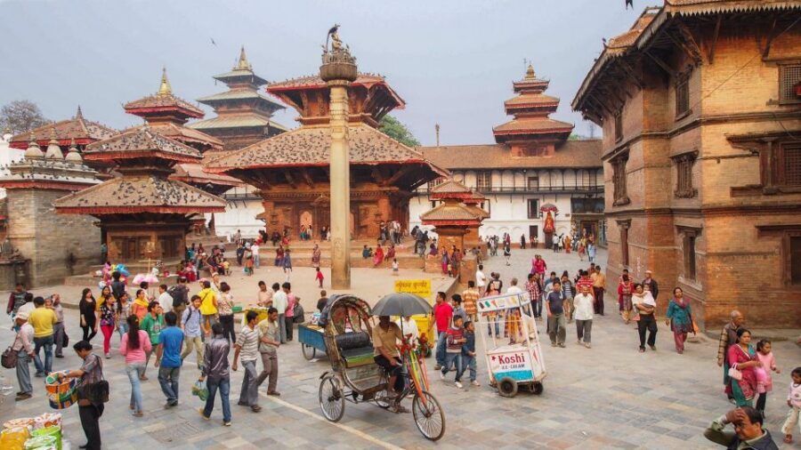 Kathmandu Sightseeing By Bus Day Trip - The guide setup: bus assistant + guide, not a one-person lecture
