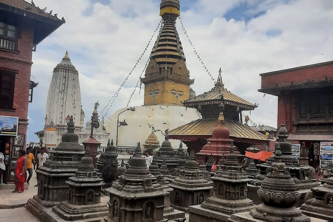 Kathmandu Top 4 or 2 UNESCO World Heritage Sites Day Tour - Boudhanath Stupa: Tibetan influence and the rhythm of a holy circle